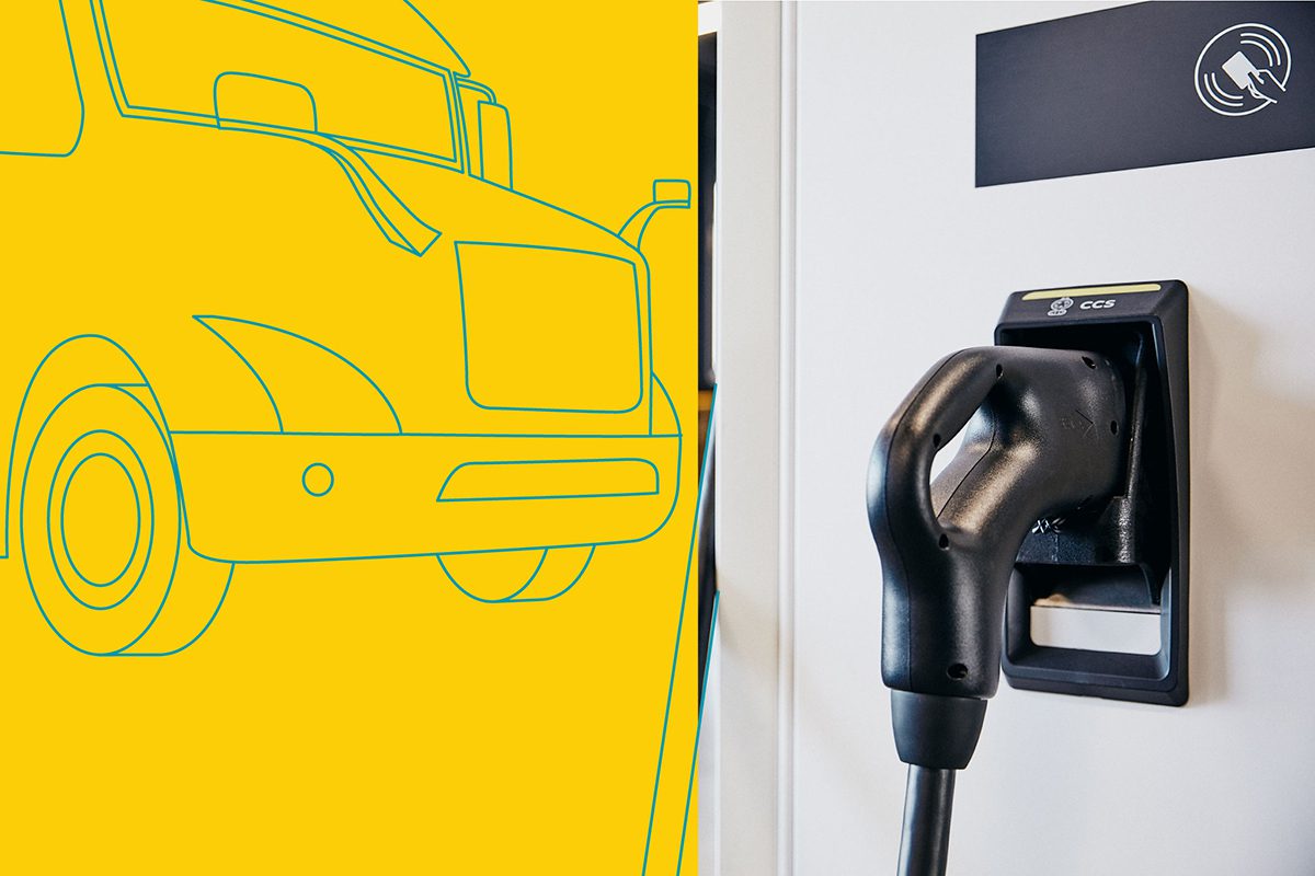 image of a electric truck charger and an illustration of a semi truck in yellow