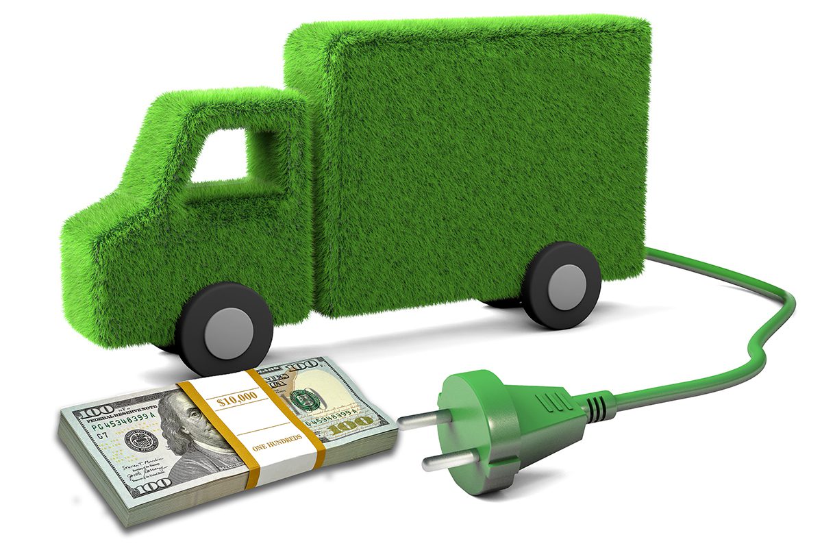 Electric truck. Grass truck with a wire and a plug from the sock